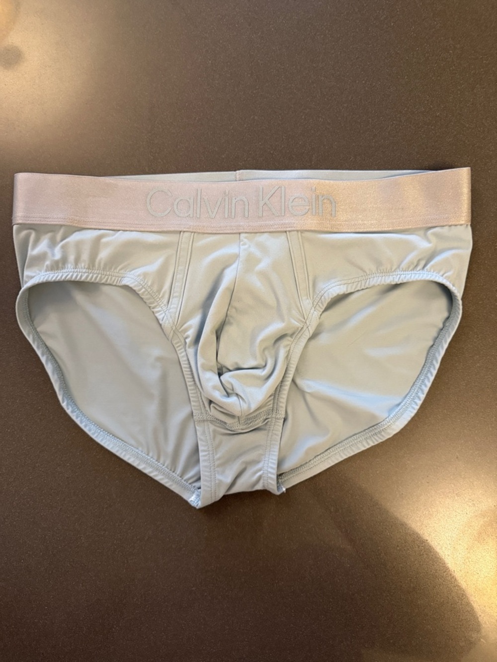 New Calvin Klein Pale Blue Briefs with Silver Waistband.  Microfiber